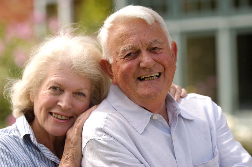 Happy smiling senior couple outdoors